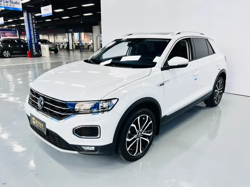 Volkswagen T-Roc Tange 280TSI DSG two-wheel drive comfort PLUS 2023 — фото 1, купить с доставкой в Москву