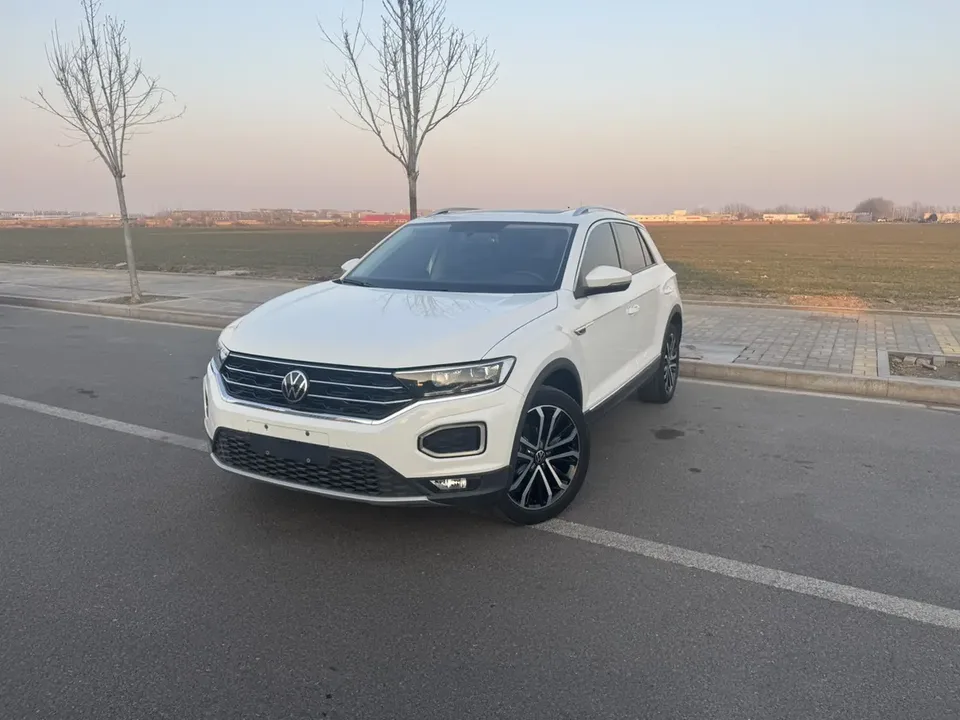 Volkswagen T-Roc Tange 280TSI DSG two-wheel drive comfort PLUS 2023 — фото 1, купить с доставкой в Москву