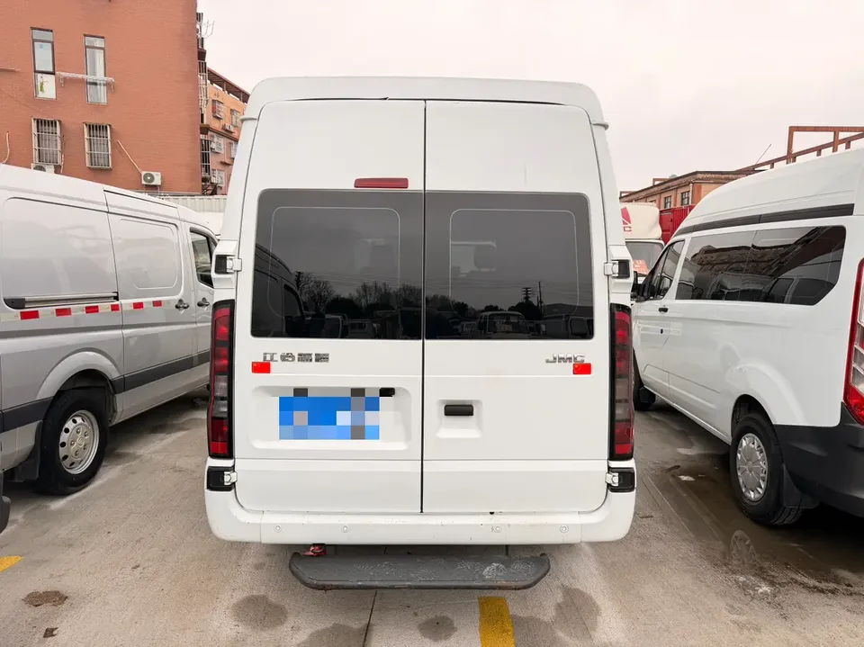 Jiangling Fushun 2.0T manual diesel mid-axle mid-roof commercial multi-purpose passenger car with 7 seats 2024 — миниатюра 2