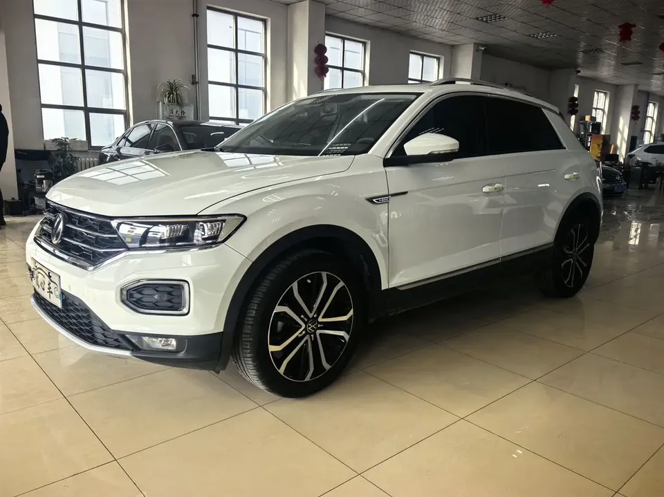 Volkswagen T-Roc Tange 280TSI DSG two-wheel drive comfort PLUS 2023 — фото 1, купить с доставкой в Москву