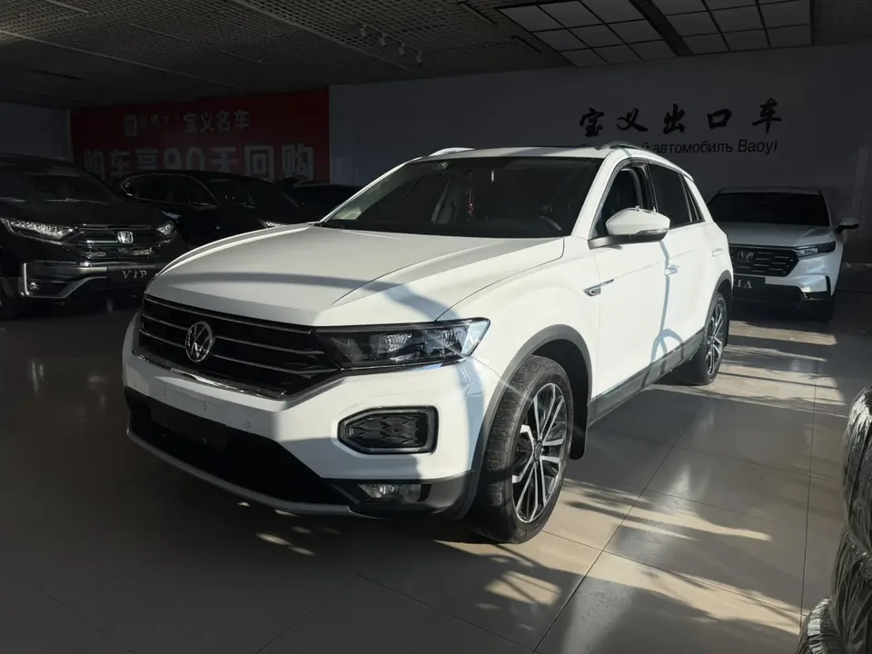 Volkswagen T-Roc Tange 280TSI DSG two-wheel drive comfort PLUS 2022 — фото 1, купить с доставкой в Москву