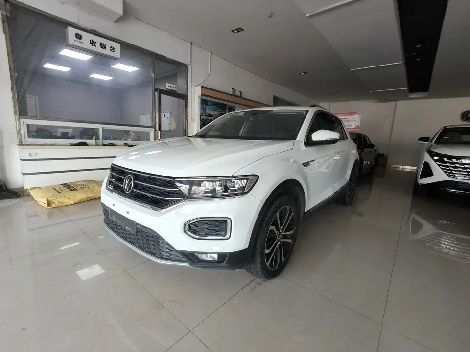 Volkswagen T-Roc Tange 280TSI DSG two-wheel drive comfort PLUS 2022 — фото 1, купить с доставкой в Москву