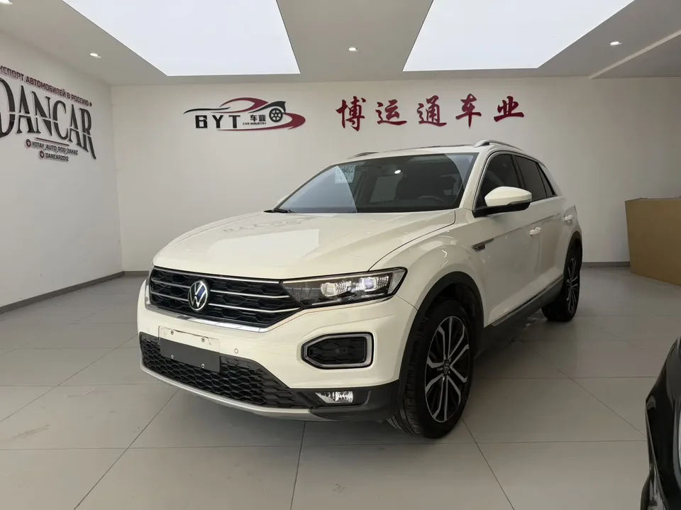 Volkswagen T-Roc Tange 280TSI DSG two-wheel drive comfort PLUS 2023 — фото 1, купить с доставкой в Москву