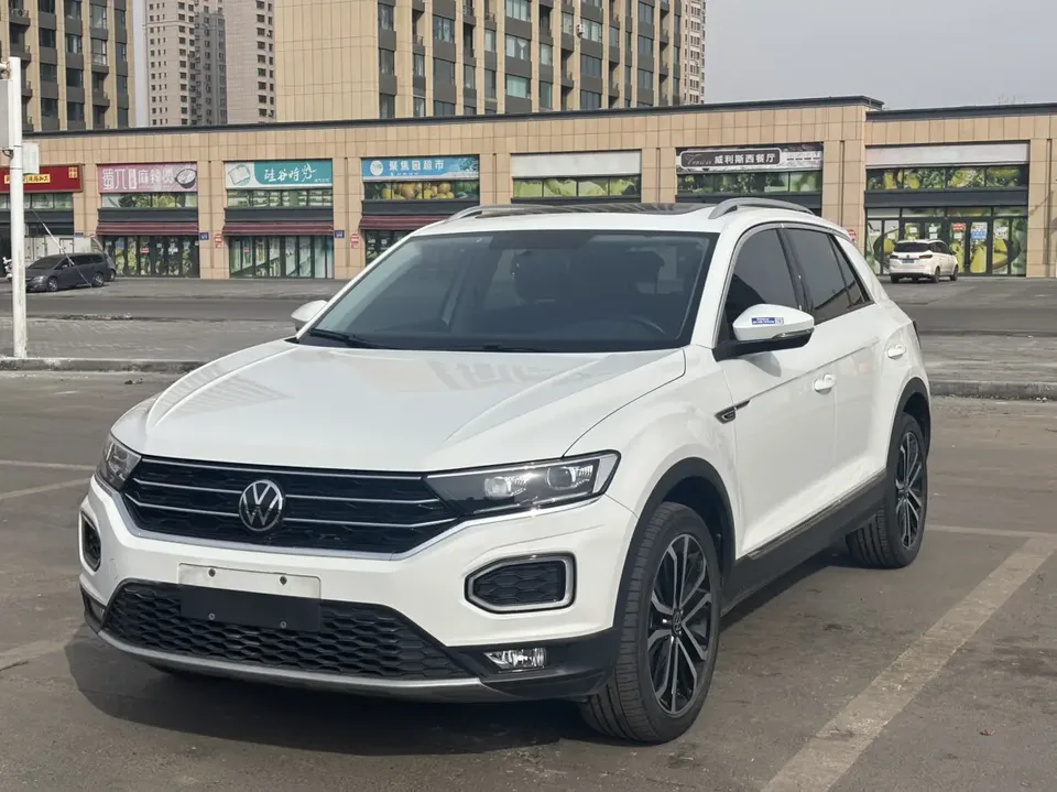 Volkswagen T-Roc T-Roc 2021 2021 Tangeu 280TSI DSG Two-Wheel Drive Elite Smart Edition 2022 — photo 1, buy with delivery to Moscow