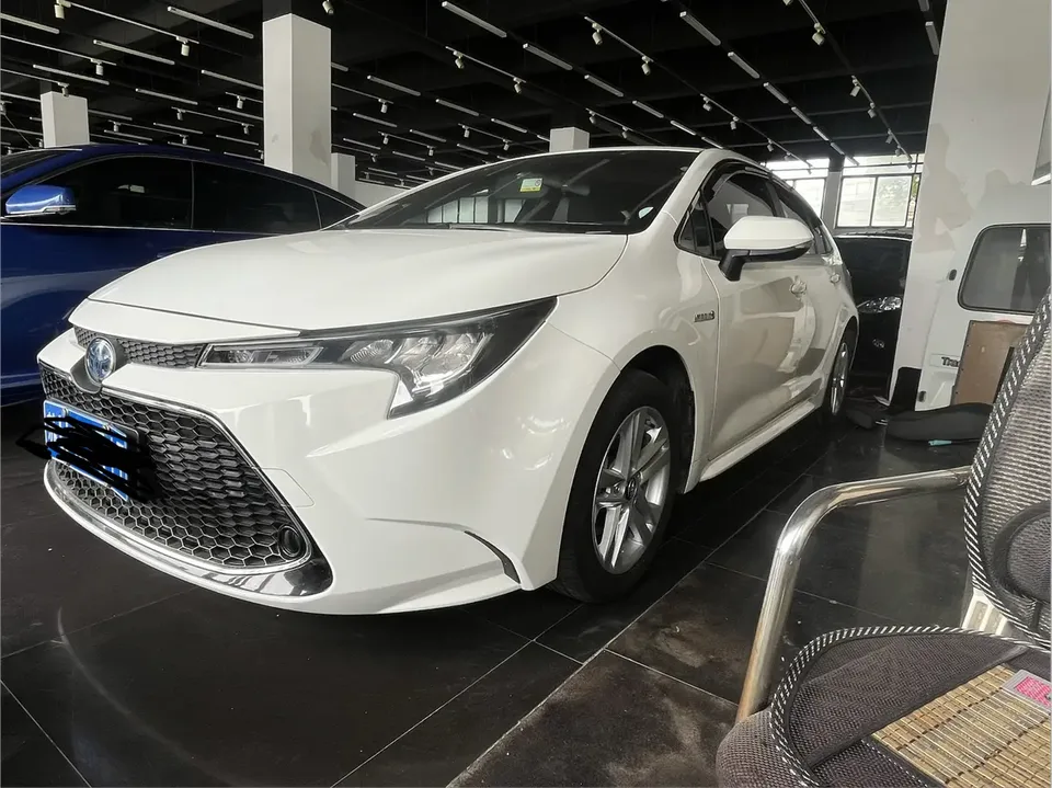 Toyota Levin 2022 Corolla Hybrid 1.8H E-CVT Progressive Edition 2022 — фото 1, купить с доставкой в Москву