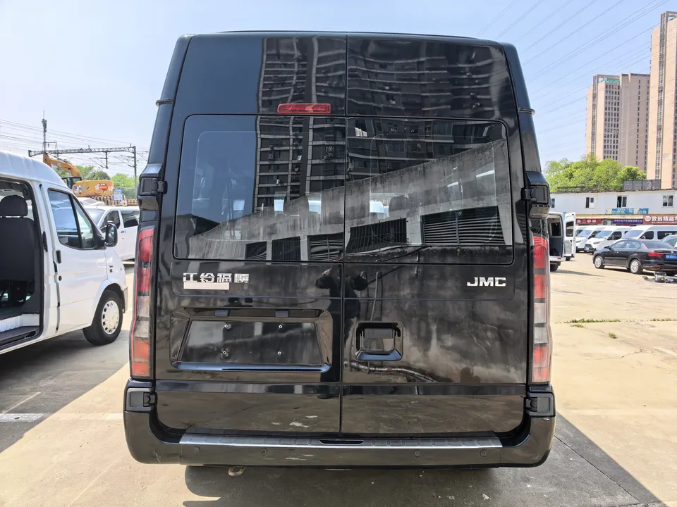 Jiangling Fushun 2.0T manual diesel short-axis mid-roof commercial multi-functional passenger car with 6 seats 2024 — миниатюра 5