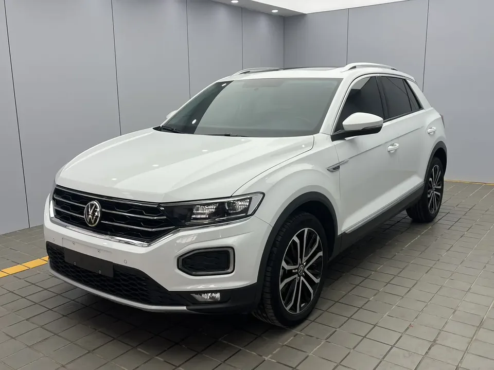 Volkswagen T-Roc Tange 280TSI DSG two-wheel drive comfort PLUS 2023 — фото 1, купить с доставкой в Москву