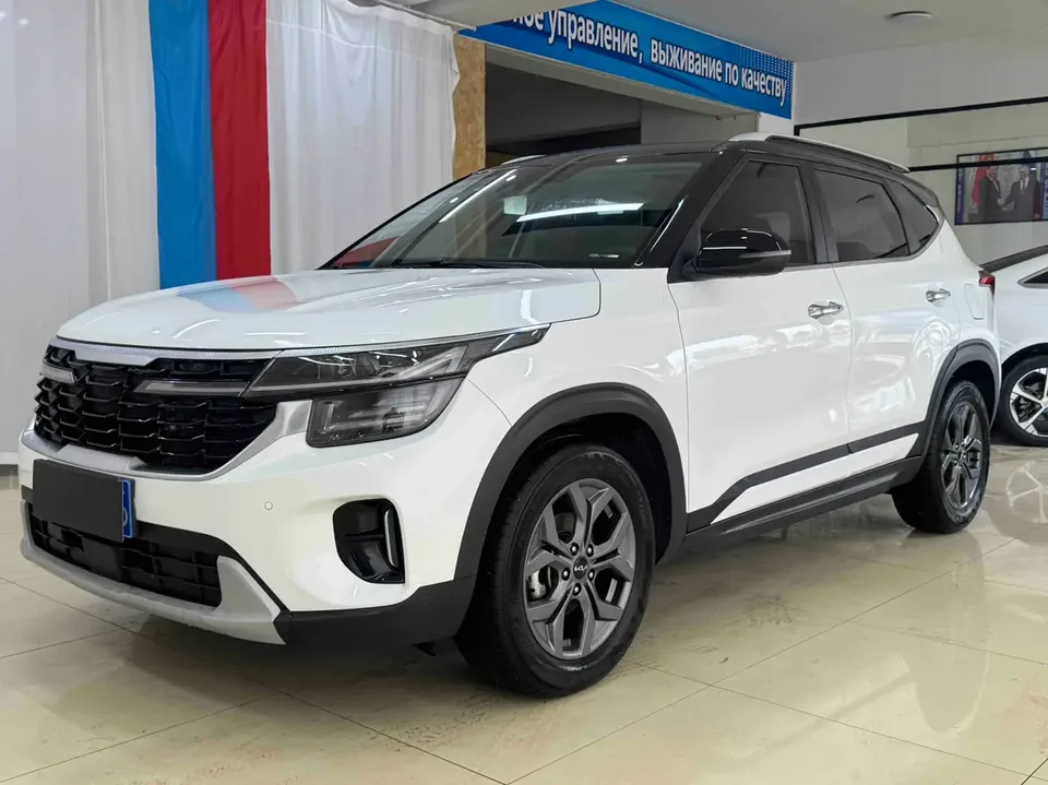 Kia Seltos 1.4T DCT Deluxe Edition 2023 — фото 1, купить с доставкой в Москву