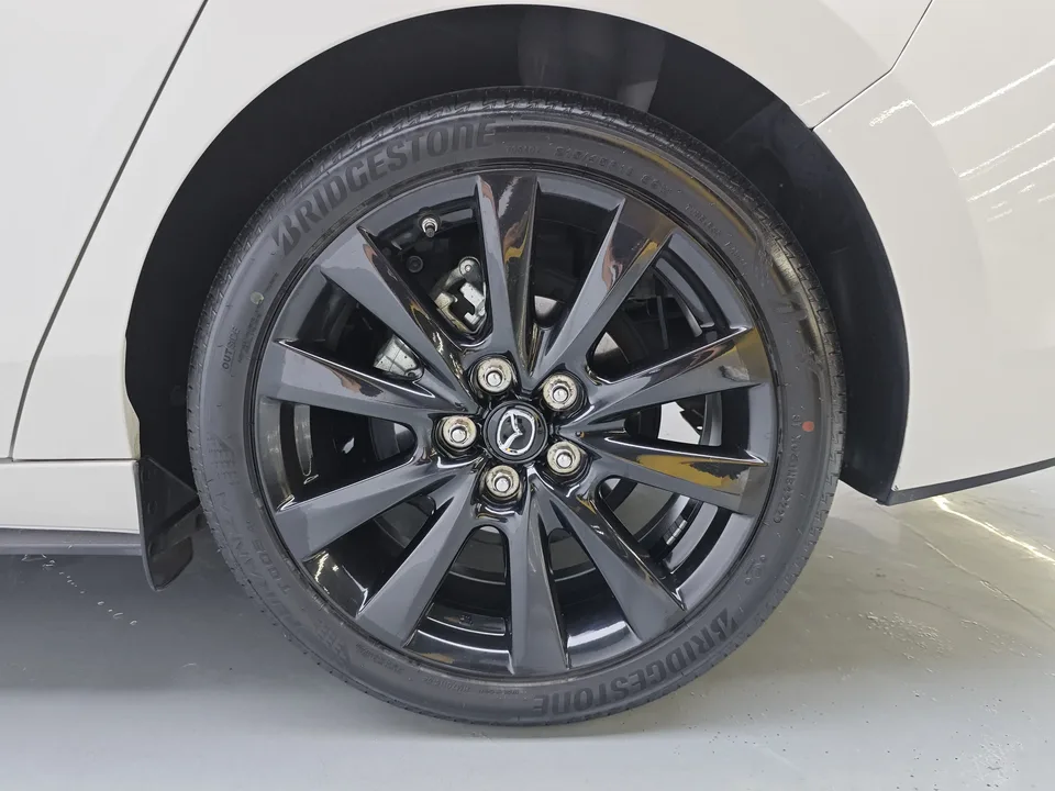 Mazda Axela 2.0L automatic premium version 2023 — photo 1, buy with delivery to Moscow