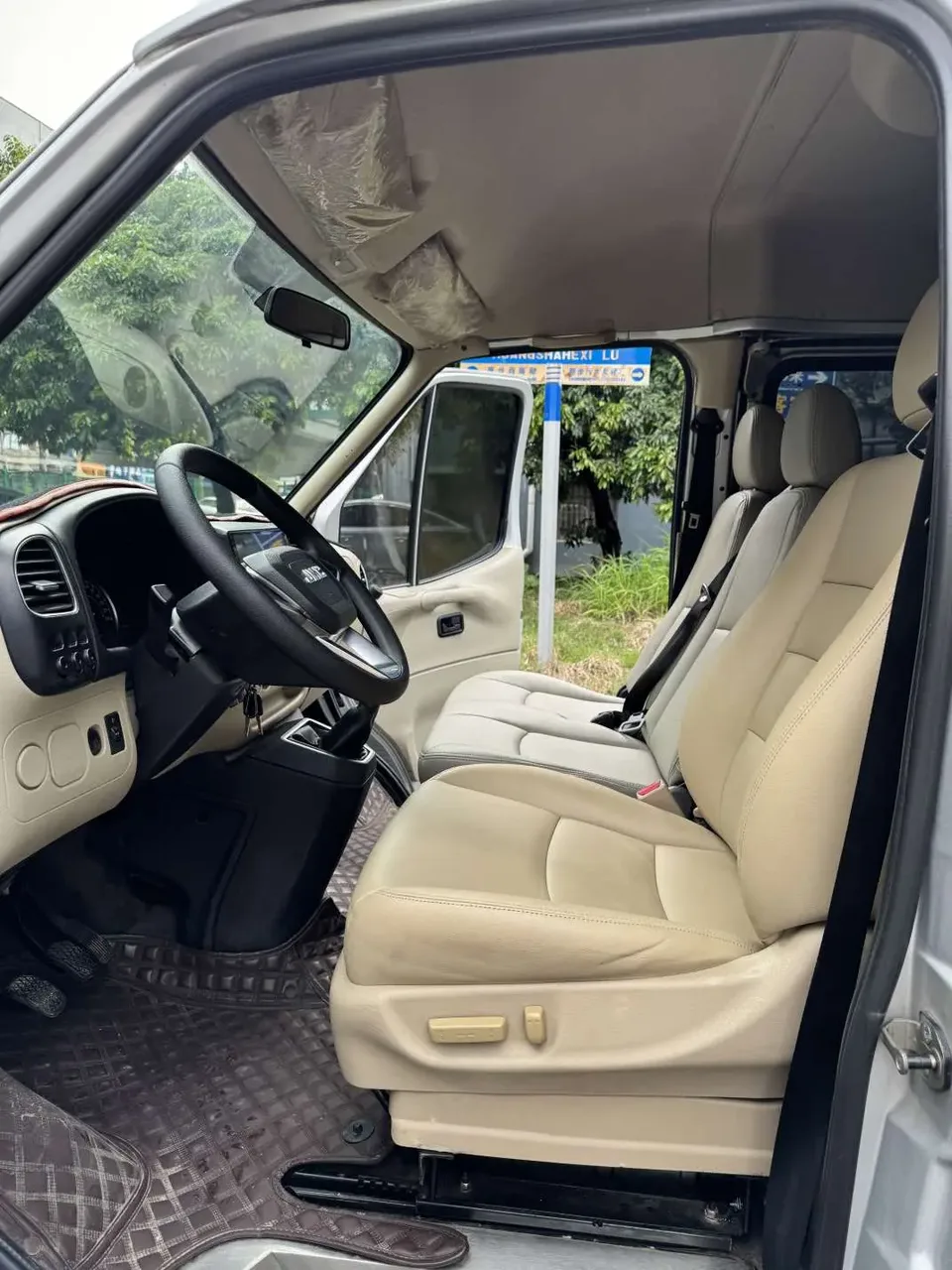 Jiangling Teshun 2.8T business type long axis mid-roof 9-seater National VI JX493 2022 — миниатюра 4