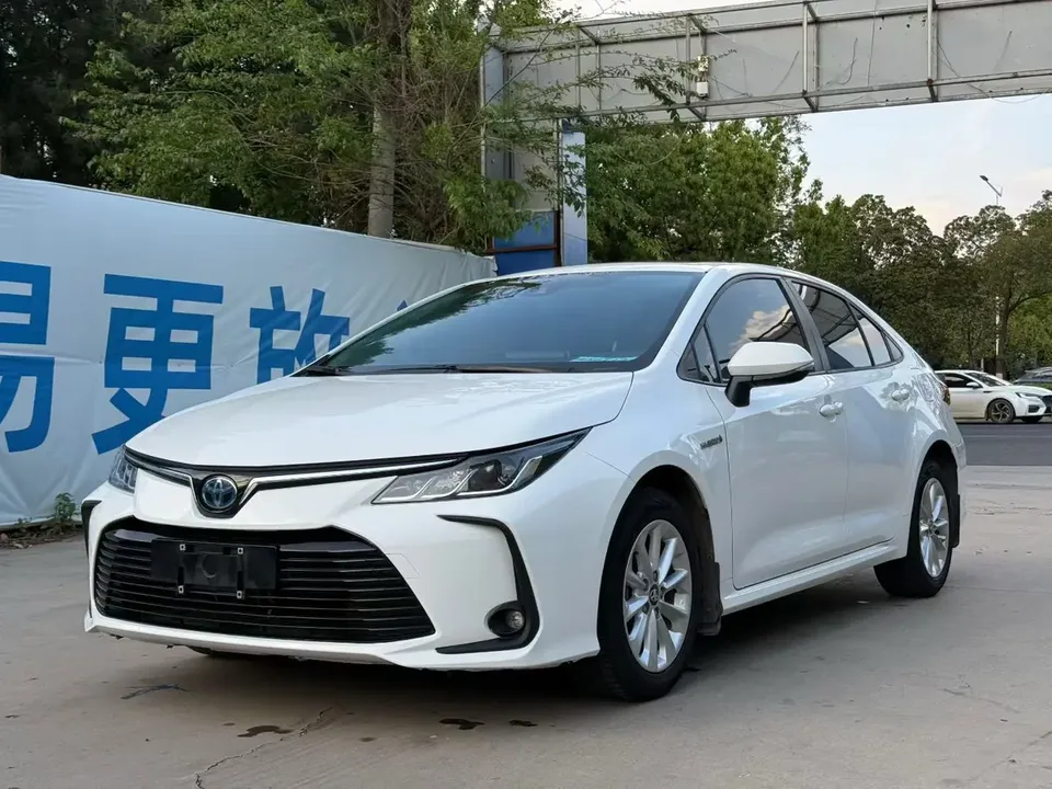 Toyota Corolla Corolla 2021 2021 Corolla Hybrid 1.8L E-CVT Elite Edition 2022 — photo 1, buy with delivery to Moscow
