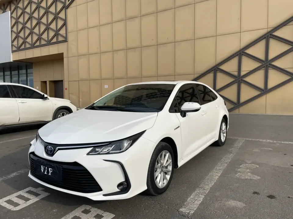 Toyota Corolla Corolla 2021 2021 Corolla Hybrid 1.8L E-CVT Elite Edition 2022 — photo 1, buy with delivery to Moscow