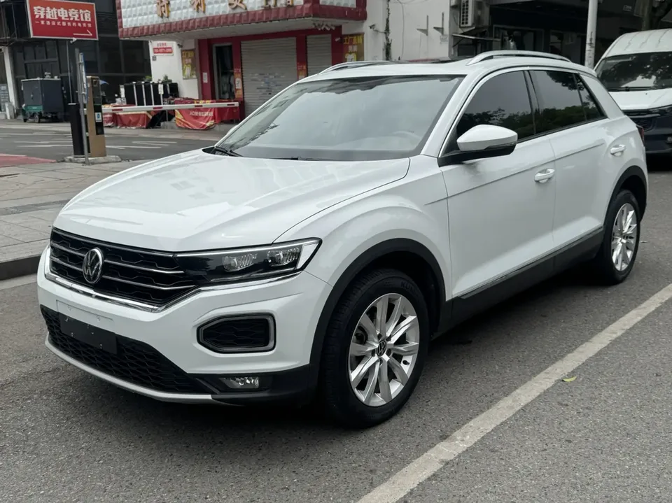 Volkswagen T-Roc T-Roc 2021 Tangeu 280TSI DSG two-wheel drive elite intelligent version 2022 — photo 1, buy with delivery to Moscow