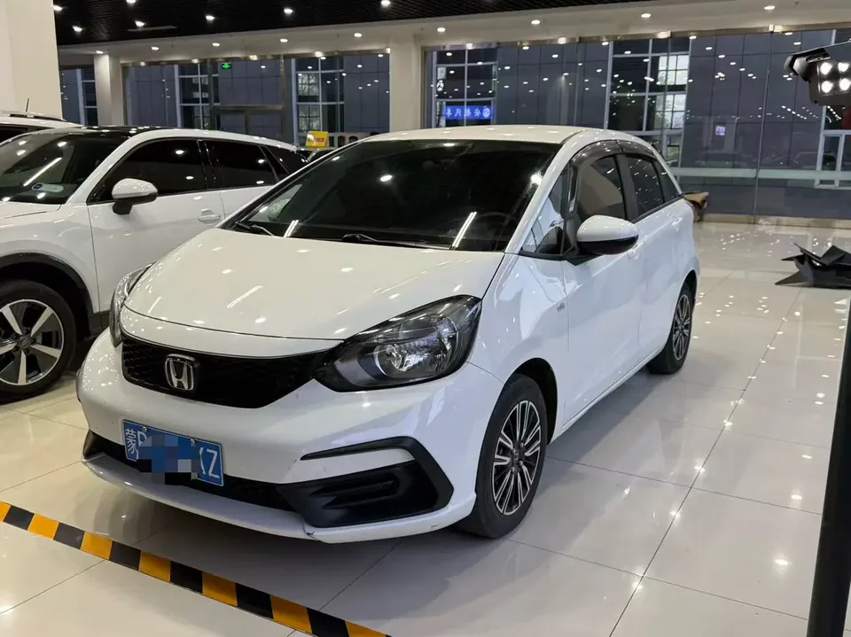 Honda FIT Fit 1.5L CVT Trendy Edition 2023 — photo 1, buy with delivery to Moscow