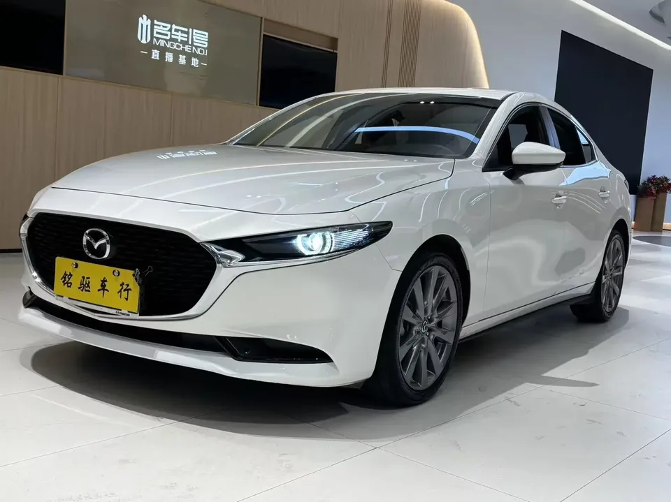 Mazda Axela Mazda3 Angkesela 2023 2.0L Automatic Quality Edition 2025 — photo 1, buy with delivery to Moscow