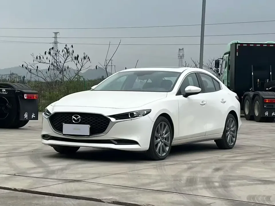 Mazda Axela Mazda3 Angkesela 2023 2.0L Automatic Quality Edition 2024 — photo 1, buy with delivery to Moscow