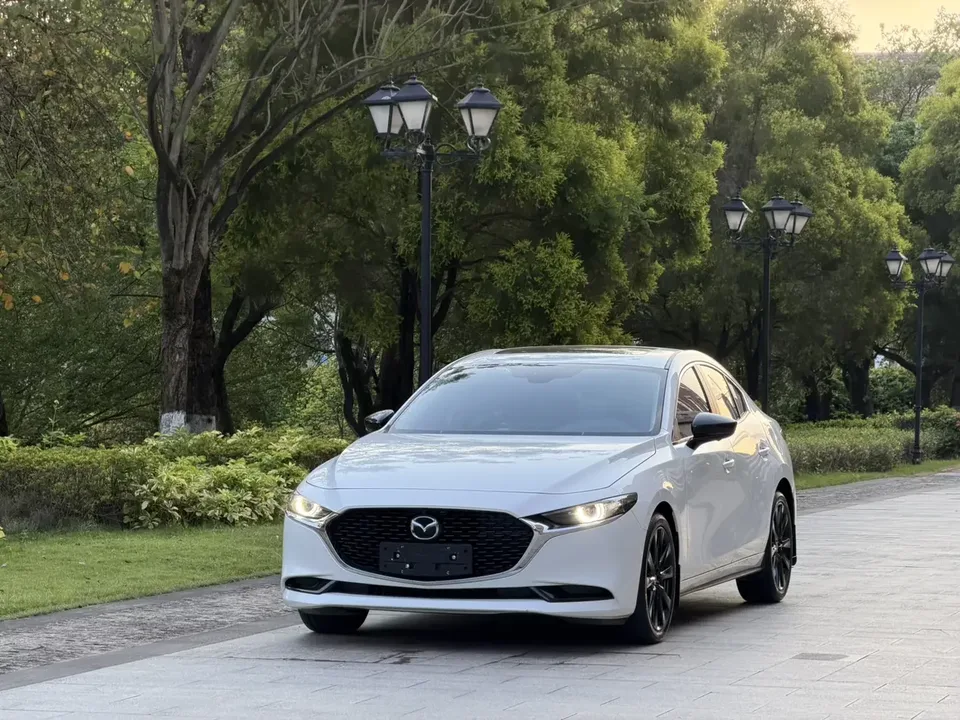 Mazda Axela Mazda3 Angkesela 2023 2.0L Automatic Quality Edition 2024 — photo 1, buy with delivery to Moscow