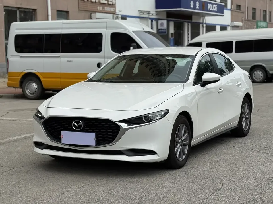 Mazda Axela Mazda3 Angkesela 2023 2.0L Automatic Quality Edition 2024 — photo 1, buy with delivery to Moscow