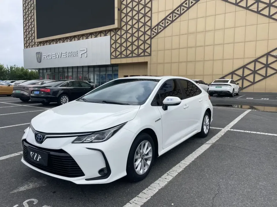 Toyota Corolla Corolla 2021 Dual Engine 1.8L E-CVT Elite Edition 2022 — photo 1, buy with delivery to Moscow