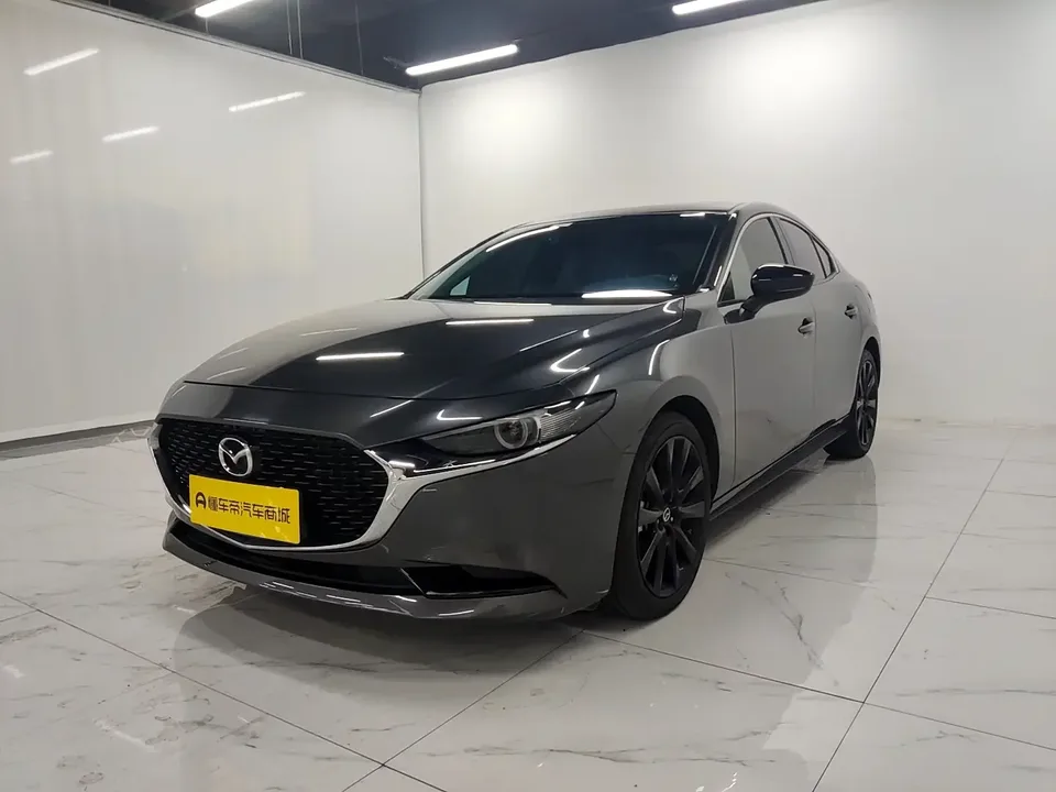 Mazda Axela Mazda3 Angkesela 2023 2.0L Automatic Quality Edition 2024 — photo 1, buy with delivery to Moscow