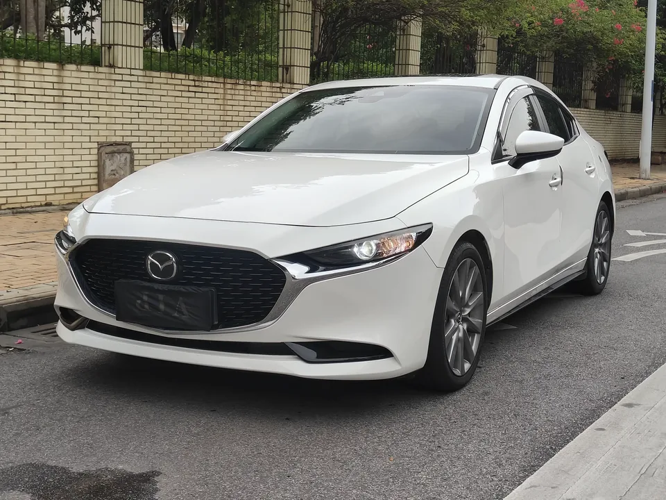 Mazda Axela Mazda3 Angkesela 2023 2.0L Automatic Quality Edition 2024 — photo 1, buy with delivery to Moscow