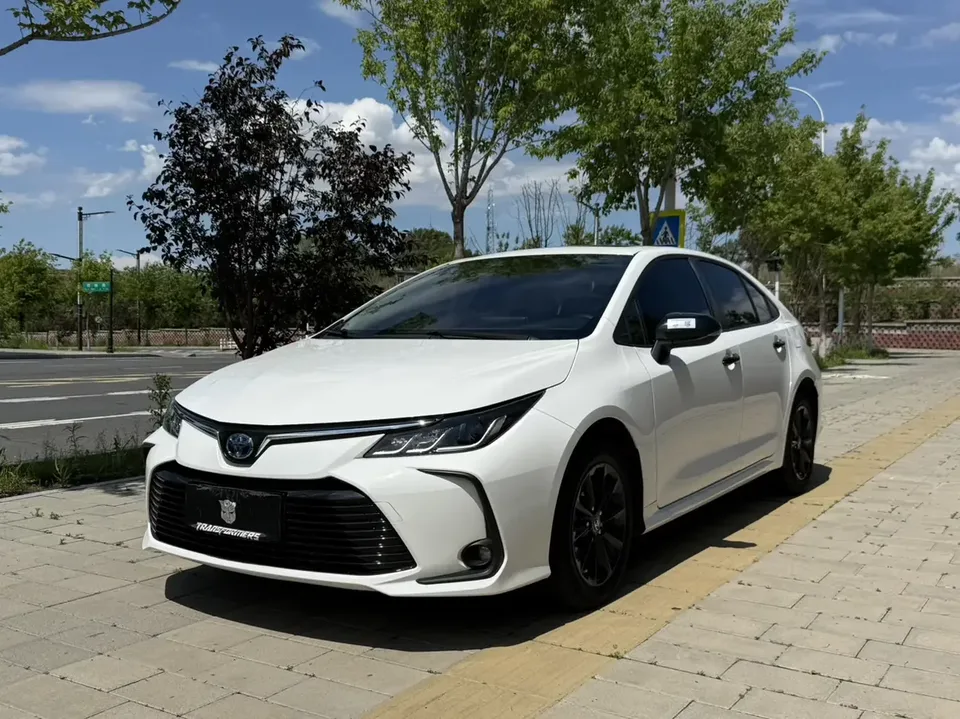 Toyota Corolla Corolla 2021 Dual Engine 1.8L E-CVT Elite Edition 2022 — photo 1, buy with delivery to Moscow