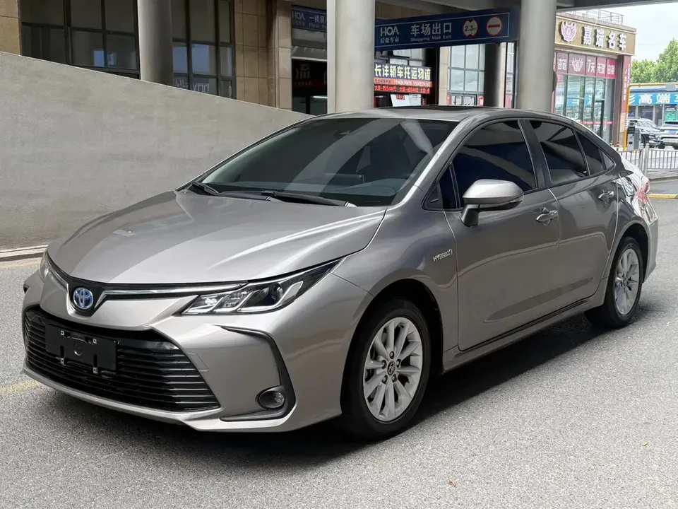 Toyota Corolla Corolla 2021 Dual Engine 1.8L E-CVT Elite Edition 2022 — photo 1, buy with delivery to Moscow