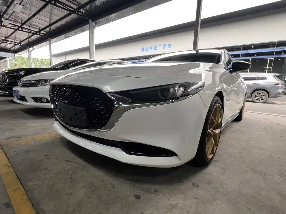 Mazda Axela Mazda3 Angkesela 2023 2.0L Automatic Quality Edition 2024 — photo 1, buy with delivery to Moscow