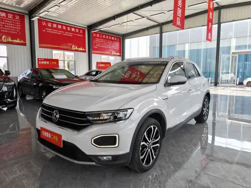 Volkswagen T-Roc TANG 2020 280TSI DSG 2WD Comfort 2023 — photo 1, buy with delivery to Moscow