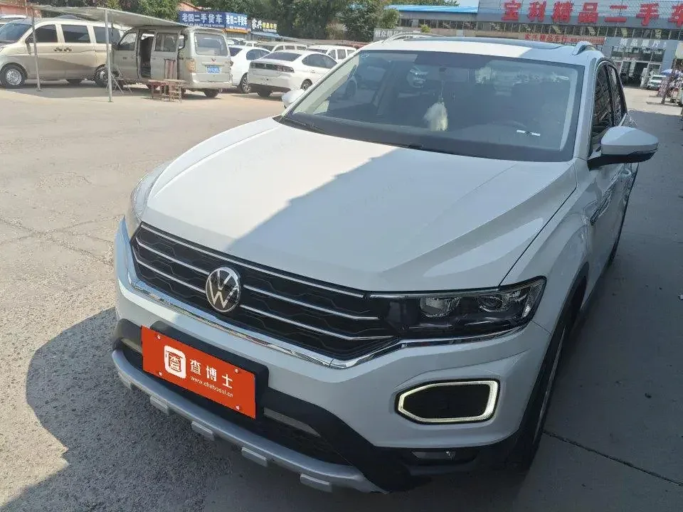 Volkswagen T-Roc TANG 2022 280TSI DSG 2WD Elite PLUS 2022 — photo 1, buy with delivery to Moscow