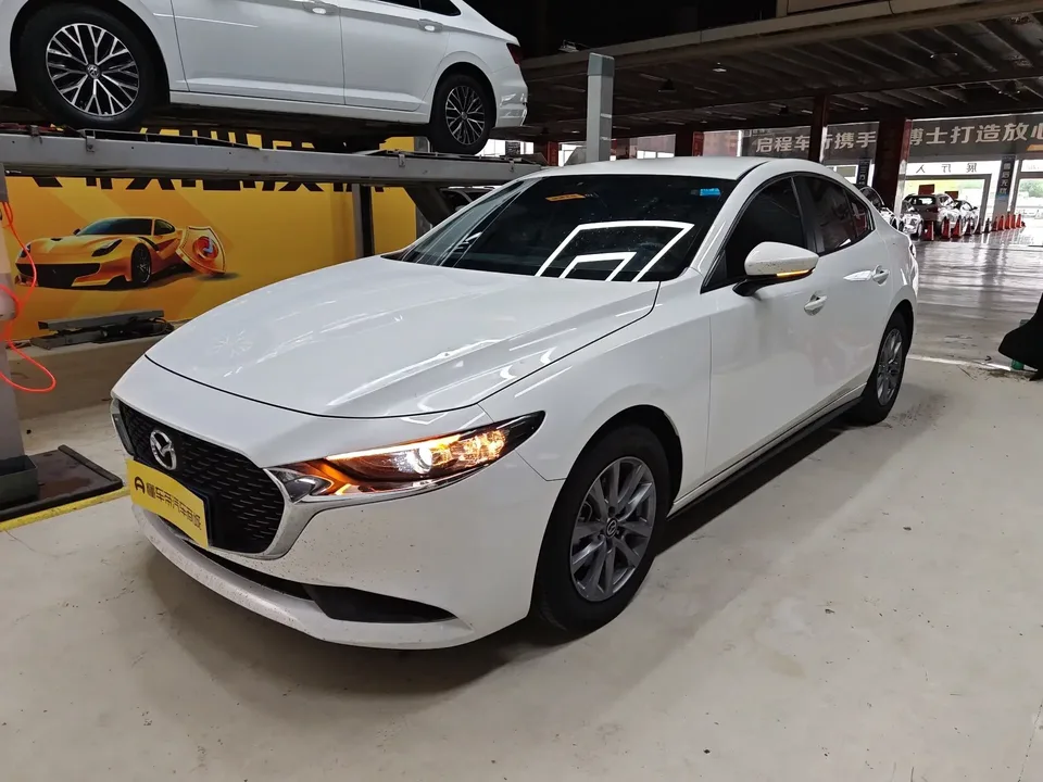 Mazda Axela Mazda3 Angkesela 2023 2.0L Automatic Quality Edition 2024 — photo 1, buy with delivery to Moscow