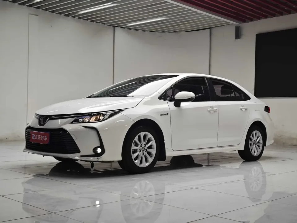 Toyota Corolla Corolla 2021 Dual Engine 1.8L E-CVT Elite Edition 2022 — photo 1, buy with delivery to Moscow