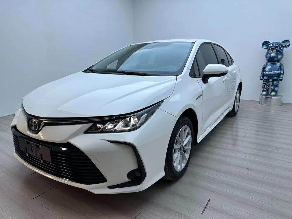 Toyota Corolla Corolla 2021 Dual Engine 1.8L E-CVT Elite Edition 2022 — photo 1, buy with delivery to Moscow