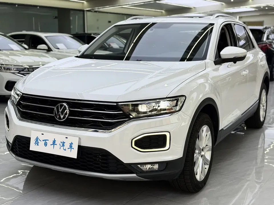 Volkswagen T-Roc Tange 280TSI DSG two-wheel drive comfort PLUS 2023 — фото 1, купить с доставкой в Москву