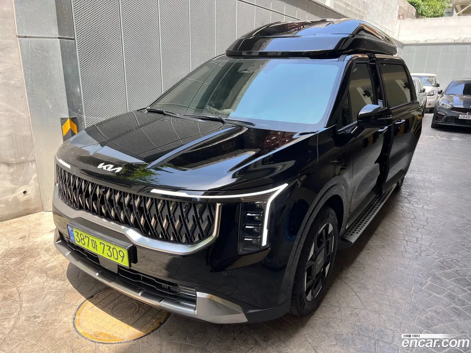 Kia Carnival HEV 4 2025 — photo 1, buy with delivery to Moscow
