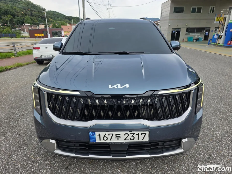 Kia Carnival HEV 7 2024 — фото 1, купить с доставкой в Москву