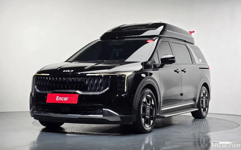 Kia Carnival HEV 7 2024 — фото 1, купить с доставкой в Москву
