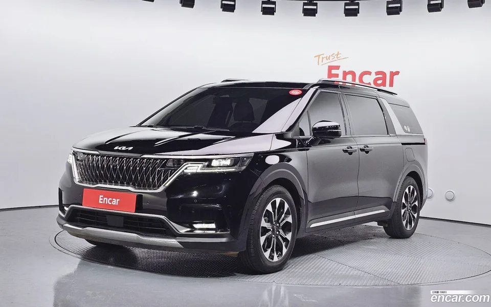 Kia Carnival 9 2023 — photo 1, buy with delivery to Moscow