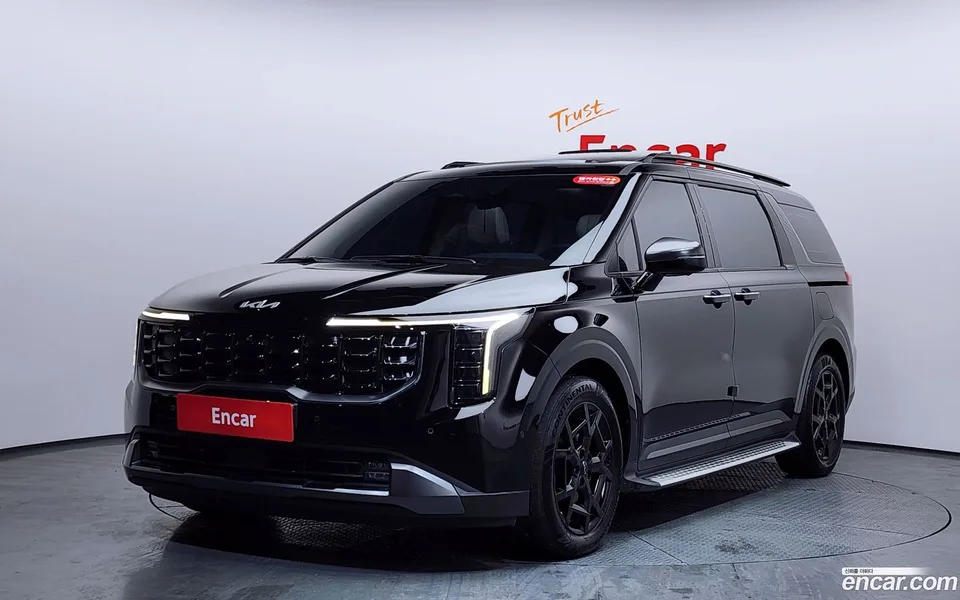 Kia Carnival HEV 7 2024 — фото 1, купить с доставкой в Москву