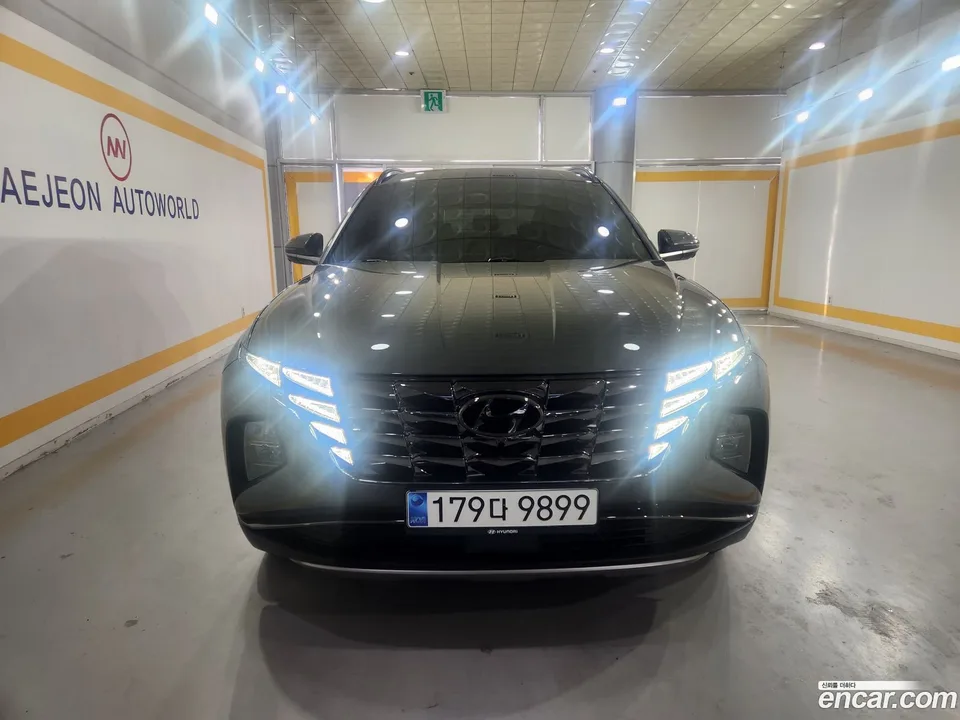 Hyundai Tucson Hybrid 4WD 2023 — фото 1, купить с доставкой в Москву