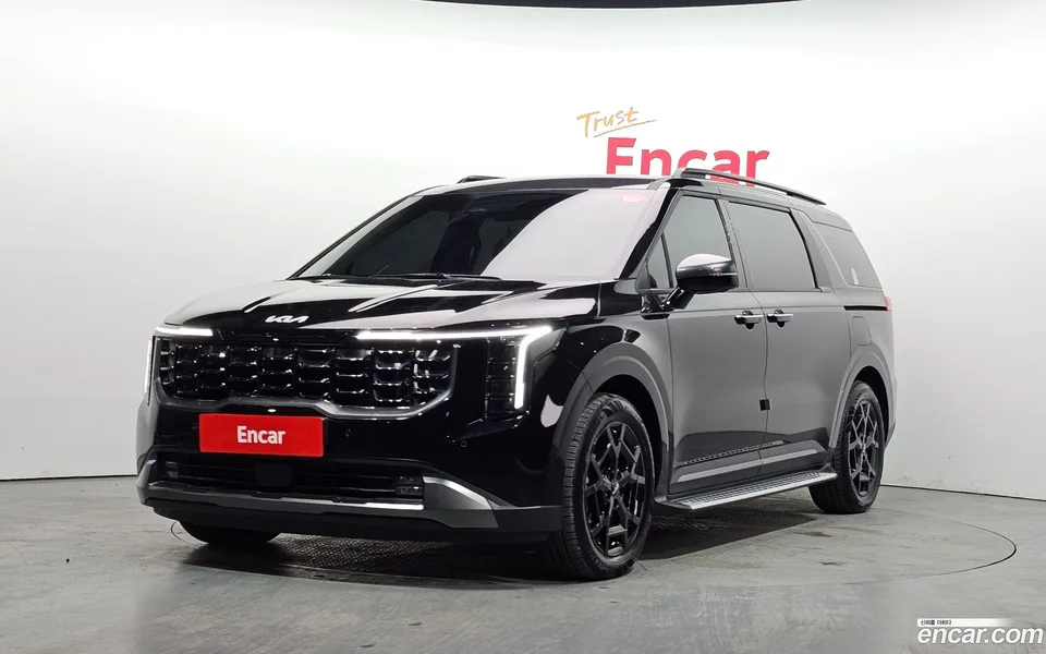 Kia Carnival HEV 7 2024 — фото 1, купить с доставкой в Москву