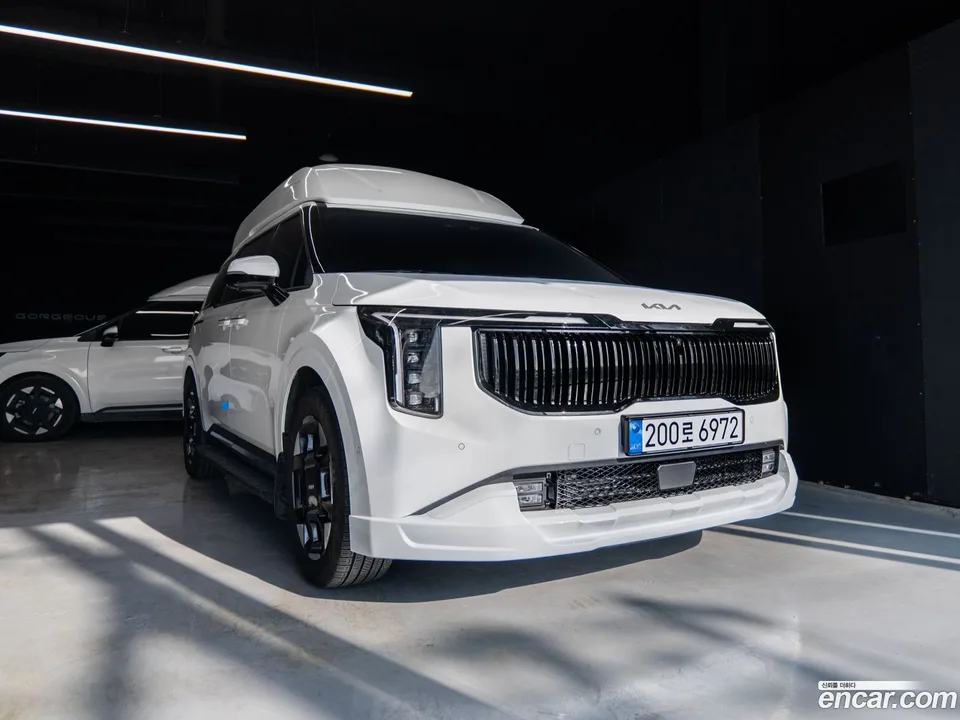 Kia Carnival HEV 9 () 2024 — photo 1, buy with delivery to Moscow
