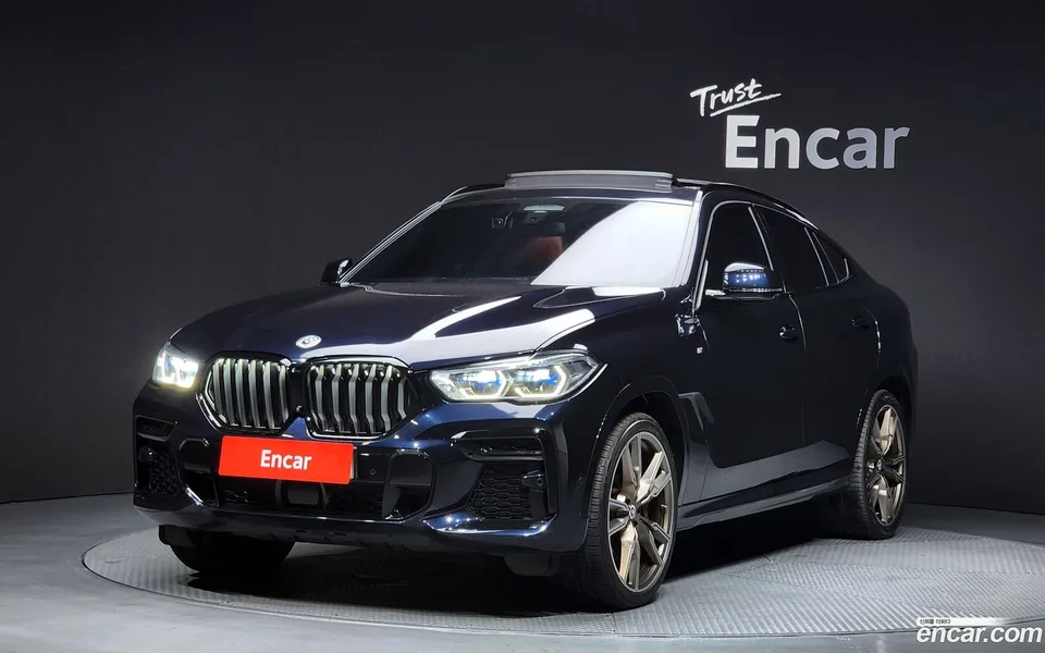 BMW X6 M50i 2023 — фото 1, купить с доставкой в Москву