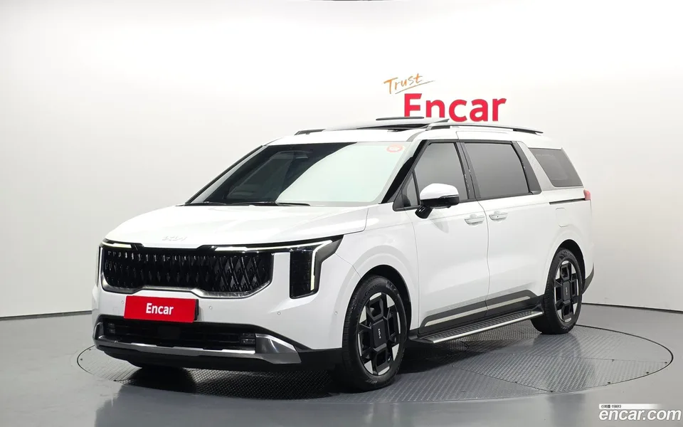 Kia Carnival HEV 7 2024 — фото 1, купить с доставкой в Москву