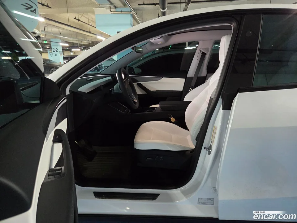 Tesla Model Y AWD 2025 — фото 1, купить с доставкой в Москву