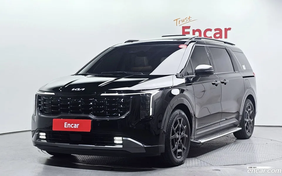 Kia Carnival HEV 7 2024 — фото 1, купить с доставкой в Москву