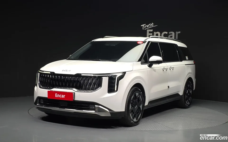 Kia Carnival HEV 9 2024 — photo 1, buy with delivery to Moscow