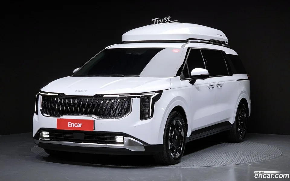 Kia Carnival HEV 9 2024 — фото 1, купить с доставкой в Москву