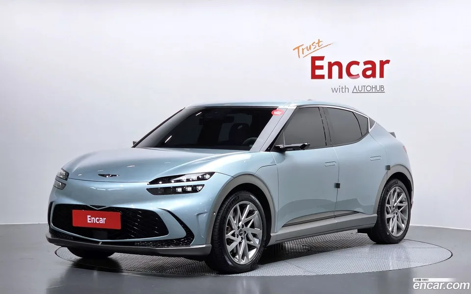 Genesis GV60 AWD 2023 — фото 1, купить с доставкой в Москву