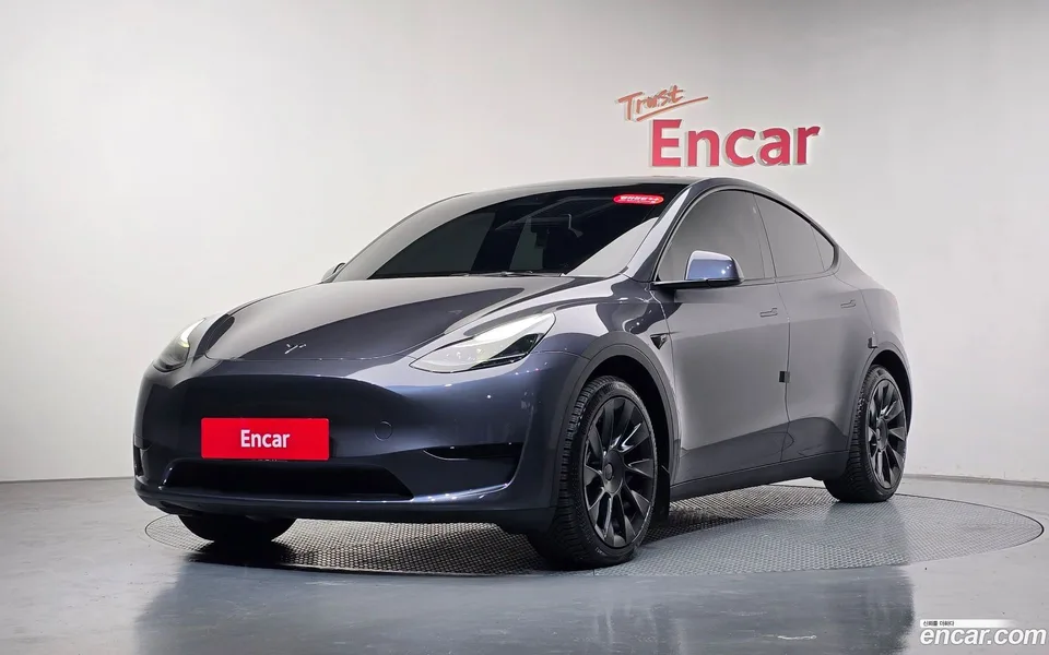 Tesla Model Y RWD 2023 — photo 1, buy with delivery to Moscow